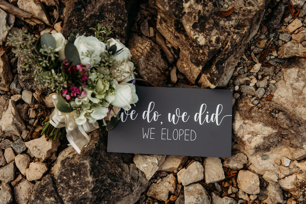 sign that says we do, we did, we eloped