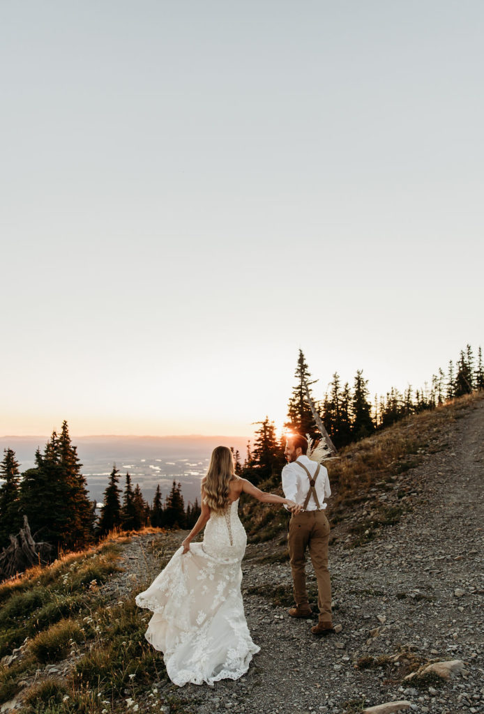 Bride and groom photos from sunset elopement in Glacier National Park
