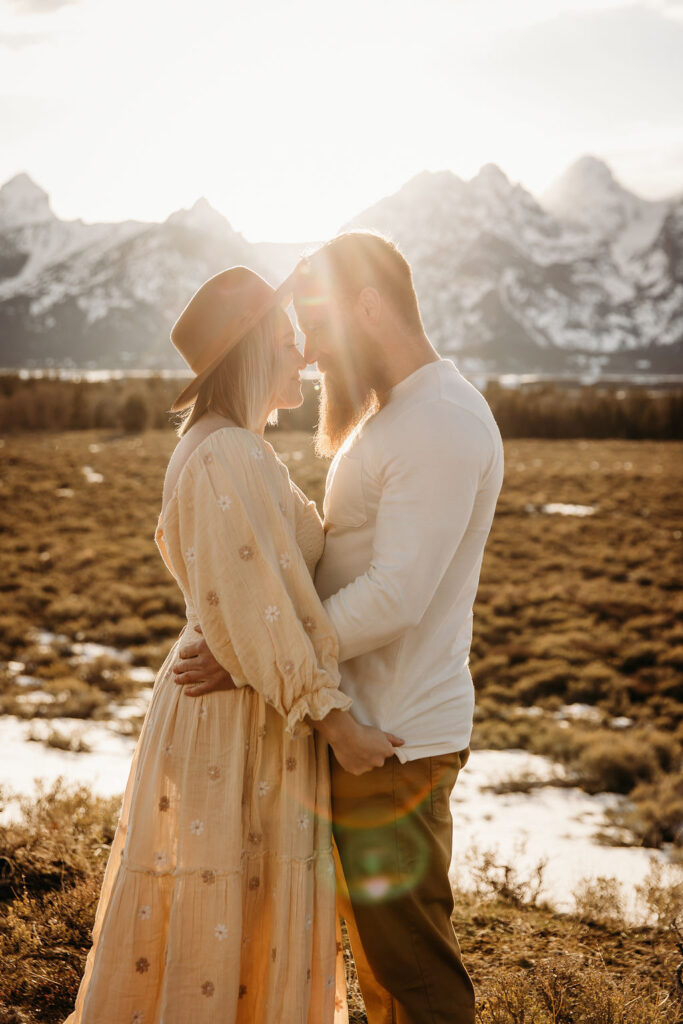 Couple posing for photoshoot in The Grand Tetons