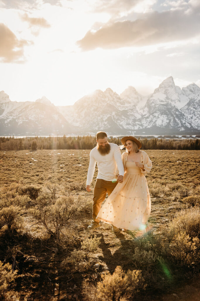 Man and woman posing for photos in Montana