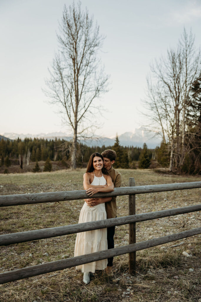 Couple posing for photos in Montana