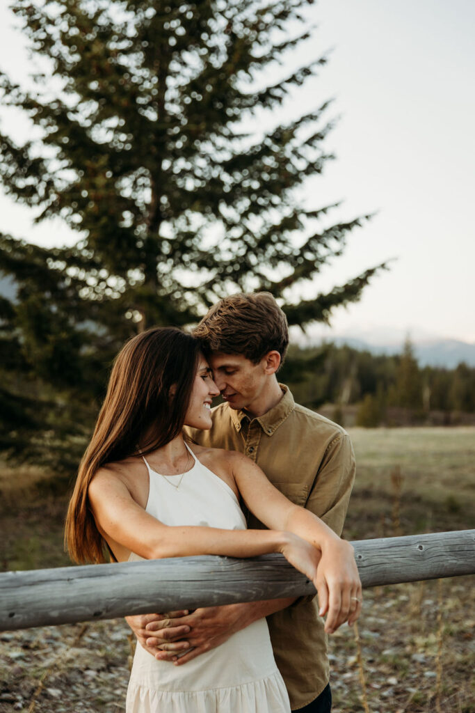 Couple posing for photos in Montana
