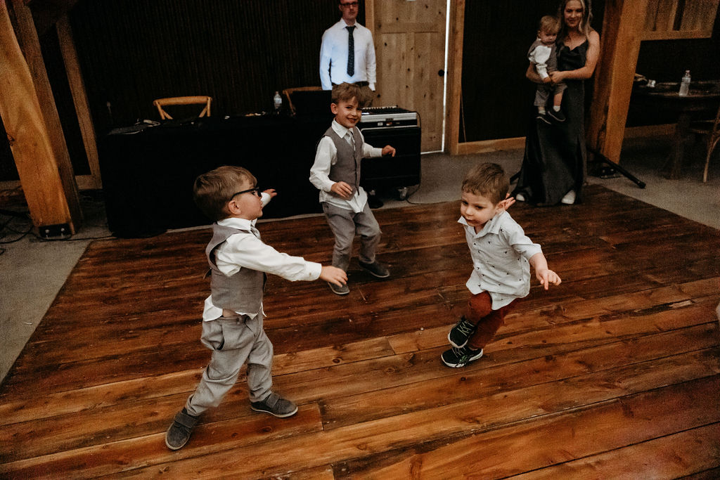Little kids dancing at reception