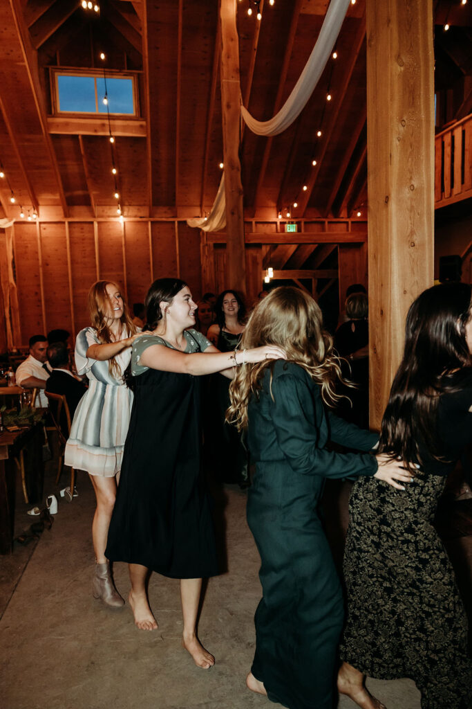 Wedding guests dancing during reception