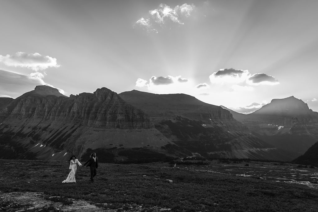 Bride and groom portraits from a whimsical mountain elopement at sunrise in Glacier National Park