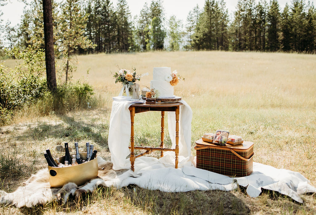 Elopement Photography Inspiration in The Mountains of Glacier National Park | Wedding cake table