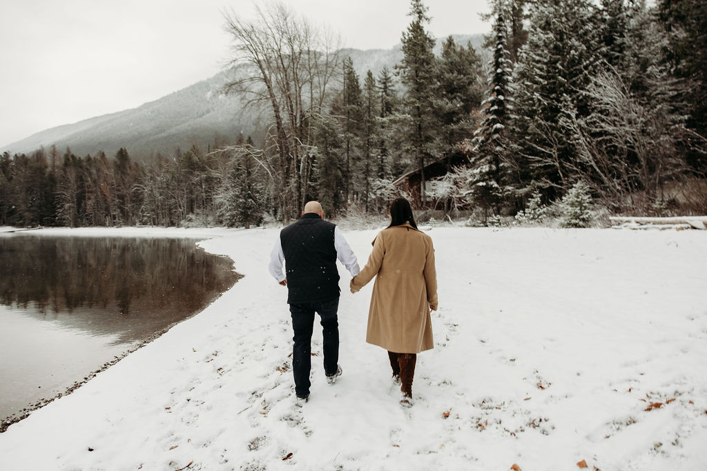 Man and woman walking in the snow