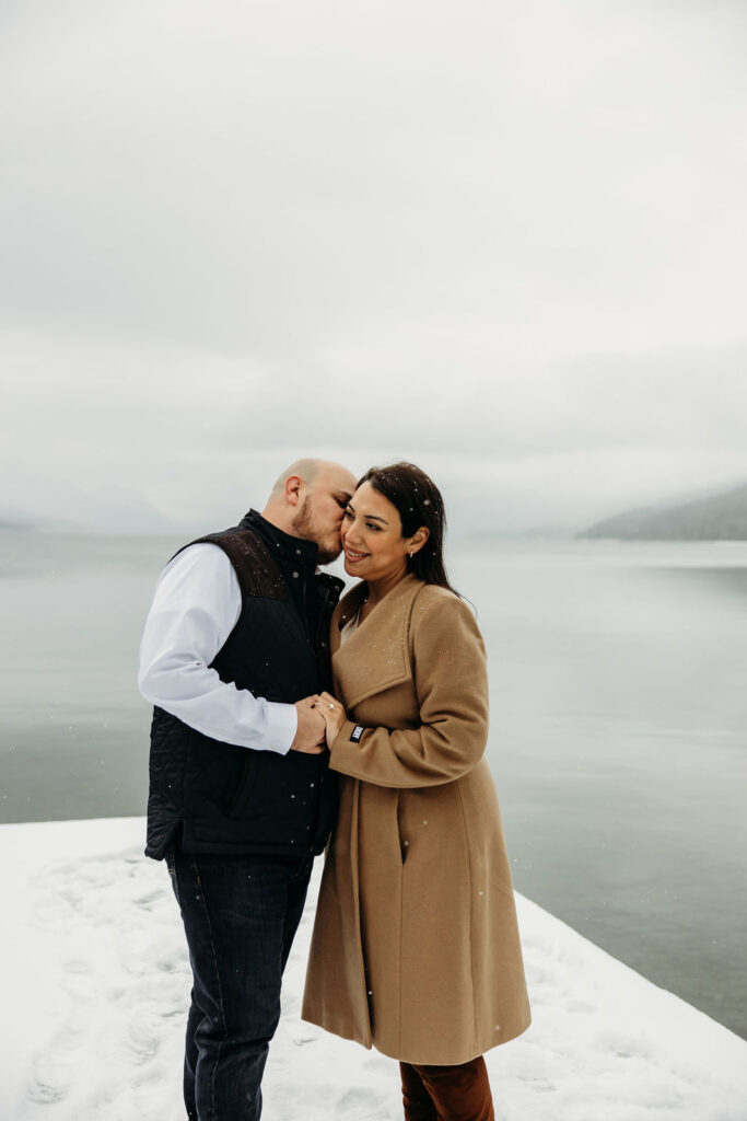 A magical winter surprise proposal at Lake McDonald in Glacier National Park
