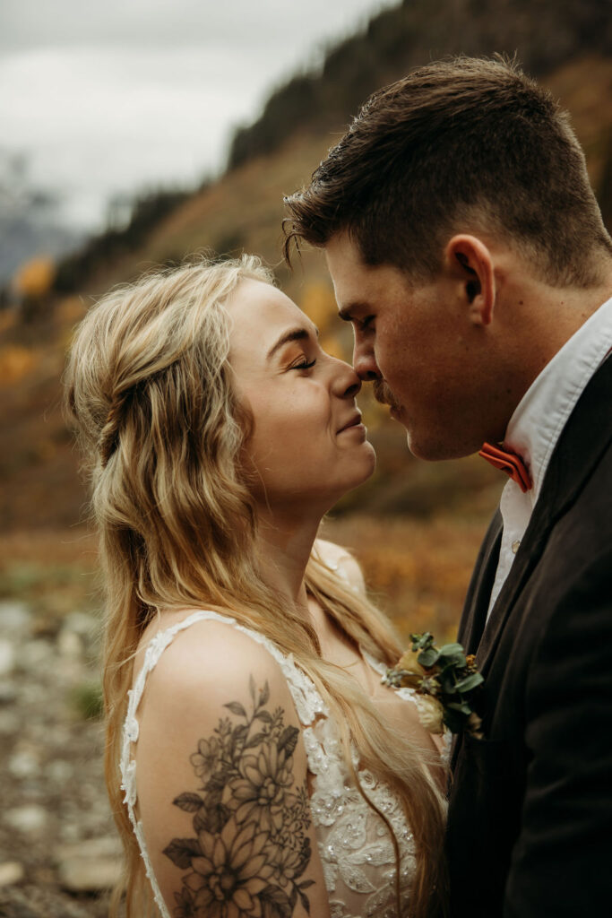 Bride and groom portraits from a fall Glacier National Park elopement 
