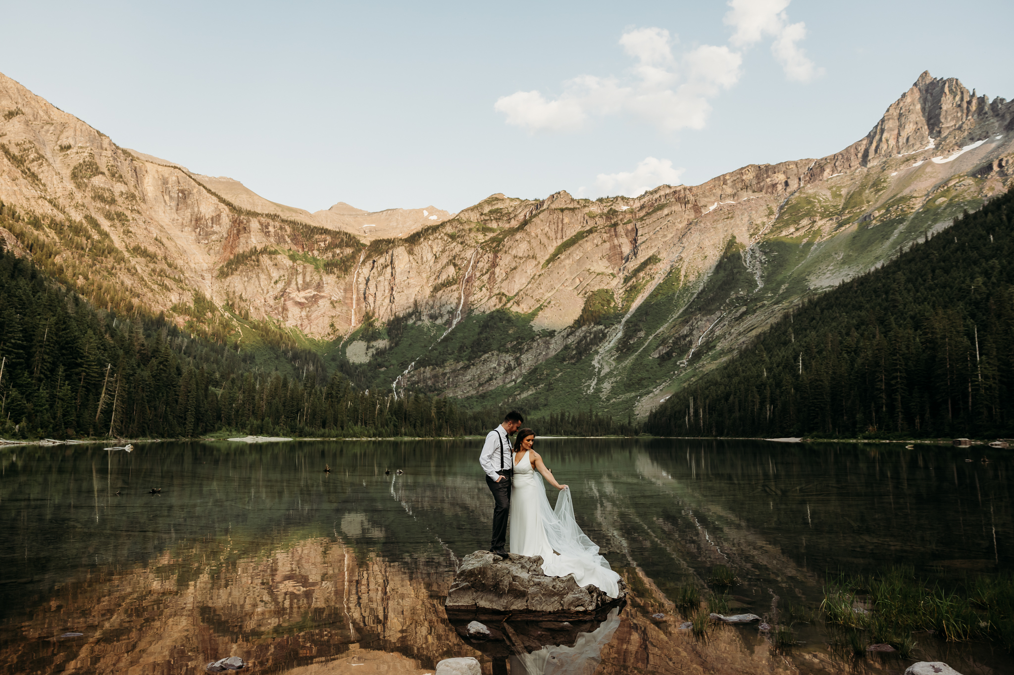 Bride and groom portraits at Avalanche Lake in GNP