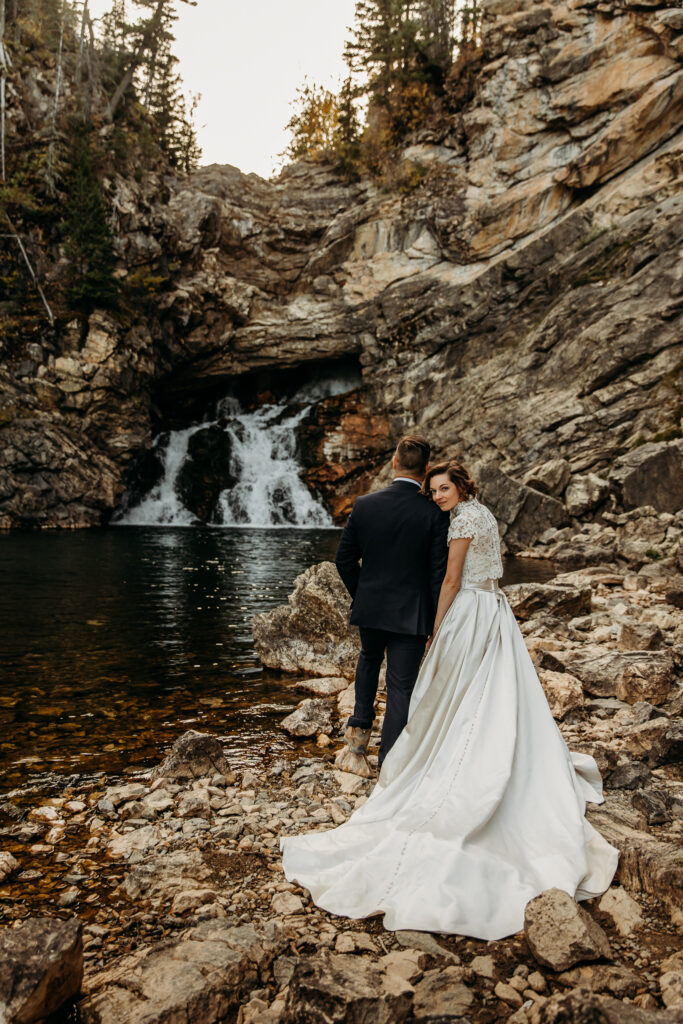 Bride and groom portraits at Running Eagle Falls