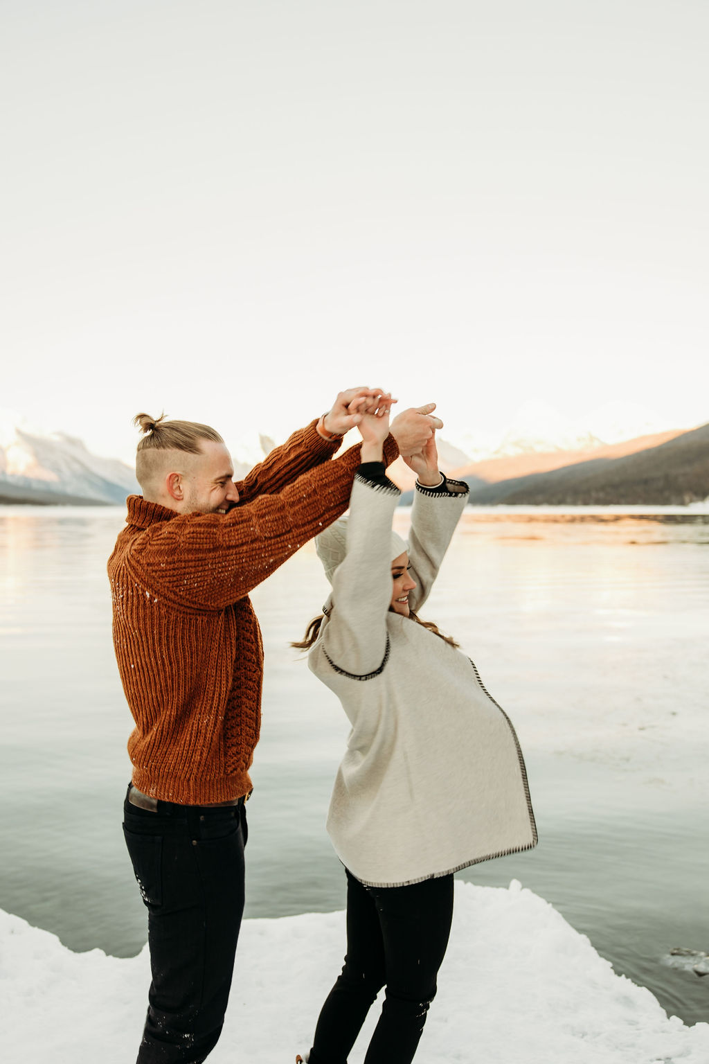 Playful couples photos at lake mcdonald