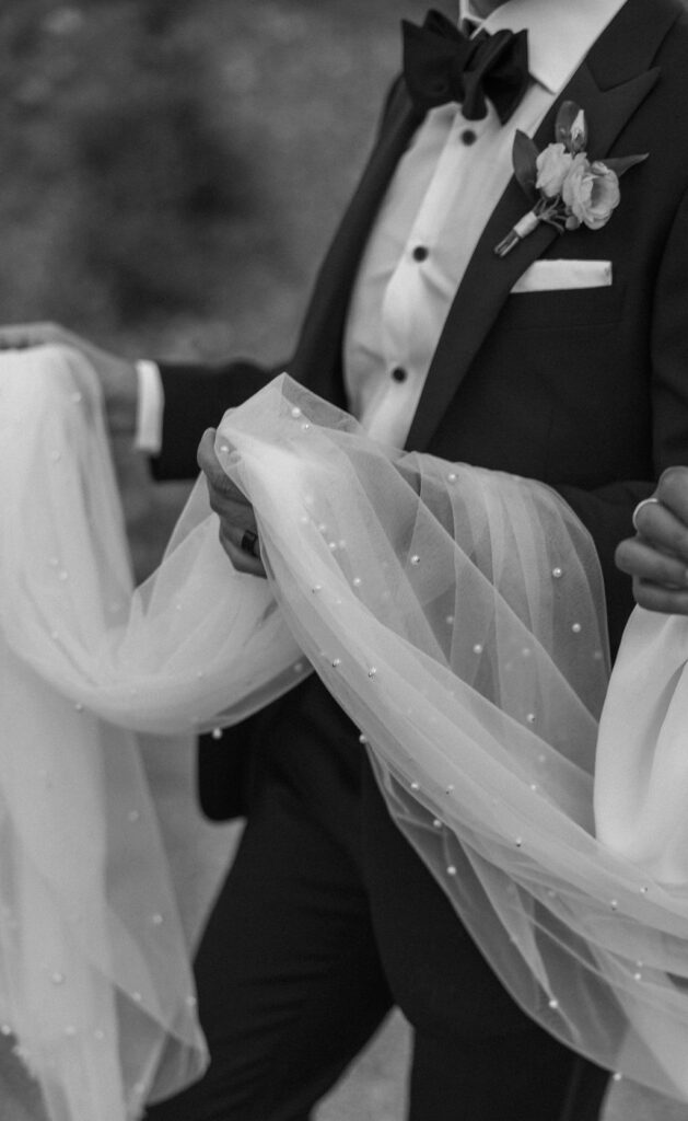 a couple posing in glacier national park for their wedding
