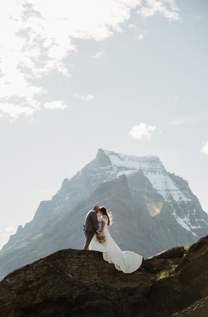 couple posing in gap for their elopement