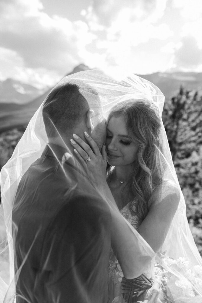 couple posing in gap for their elopement
