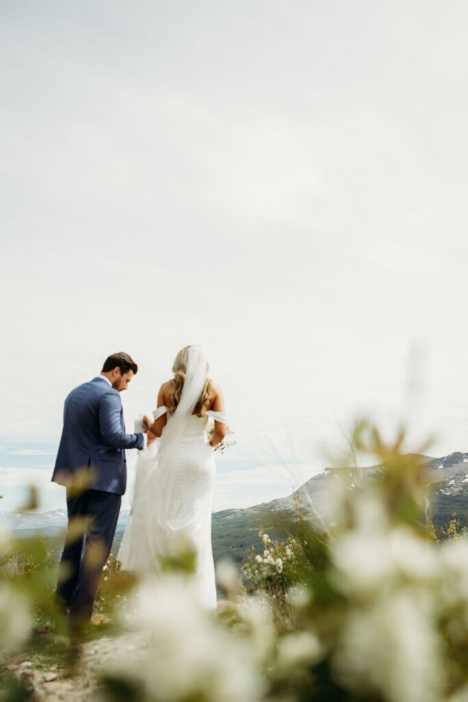 couple posing in gap for their elopement
