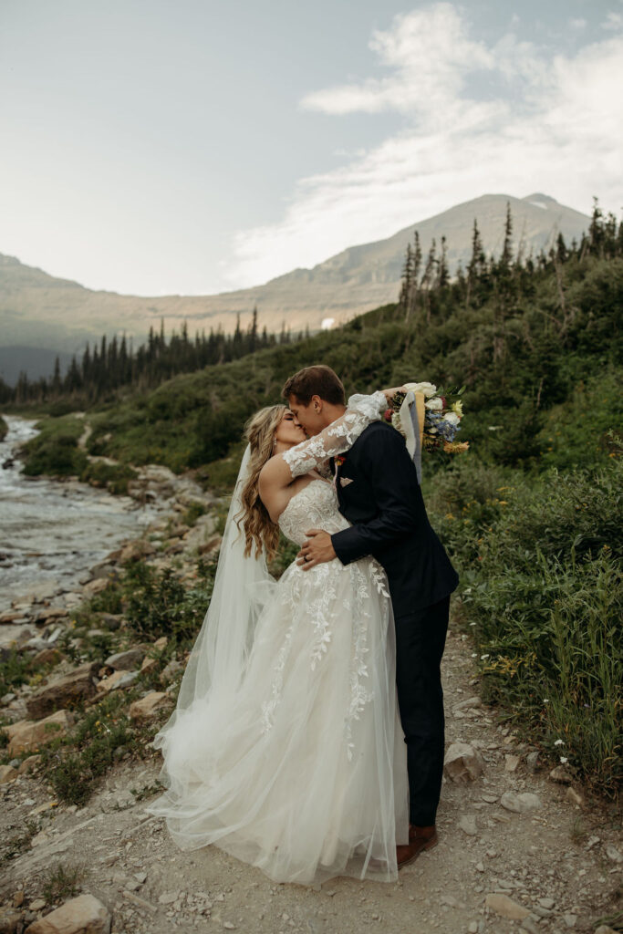 bride and groom taking elopement photos
