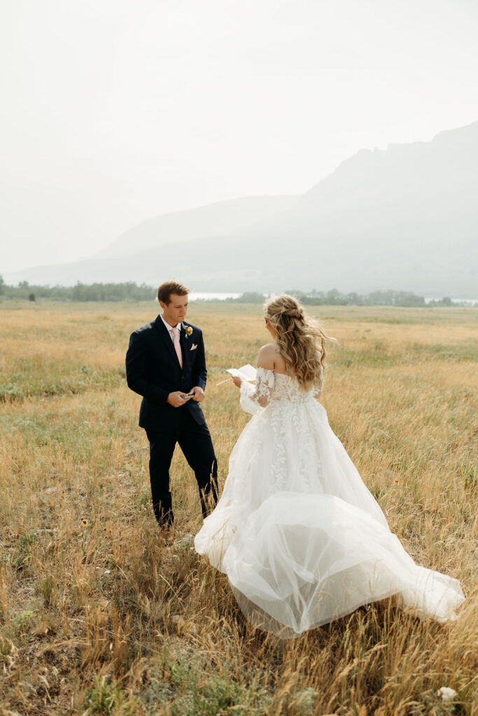 bride and groom taking elopement photos
