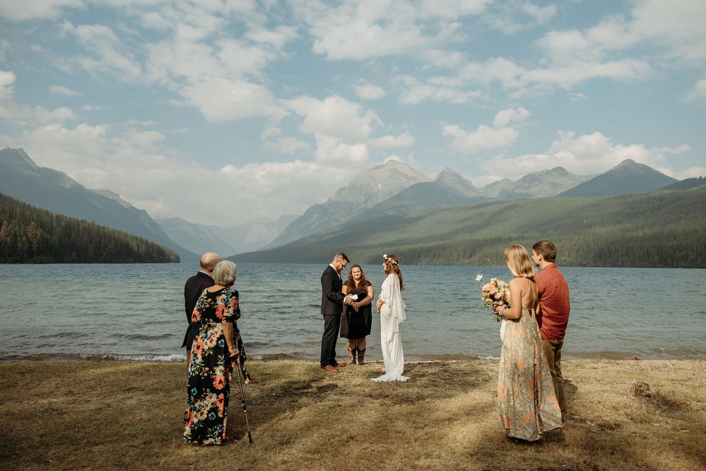 an elopement photoshoot by a lake