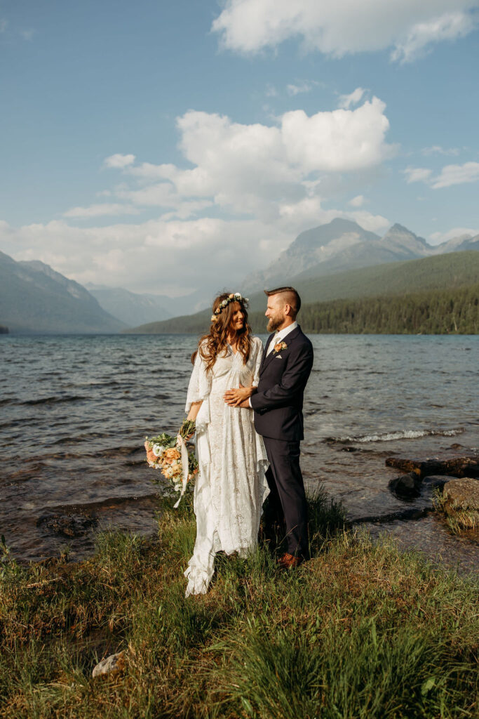 an elopement photoshoot by a lake