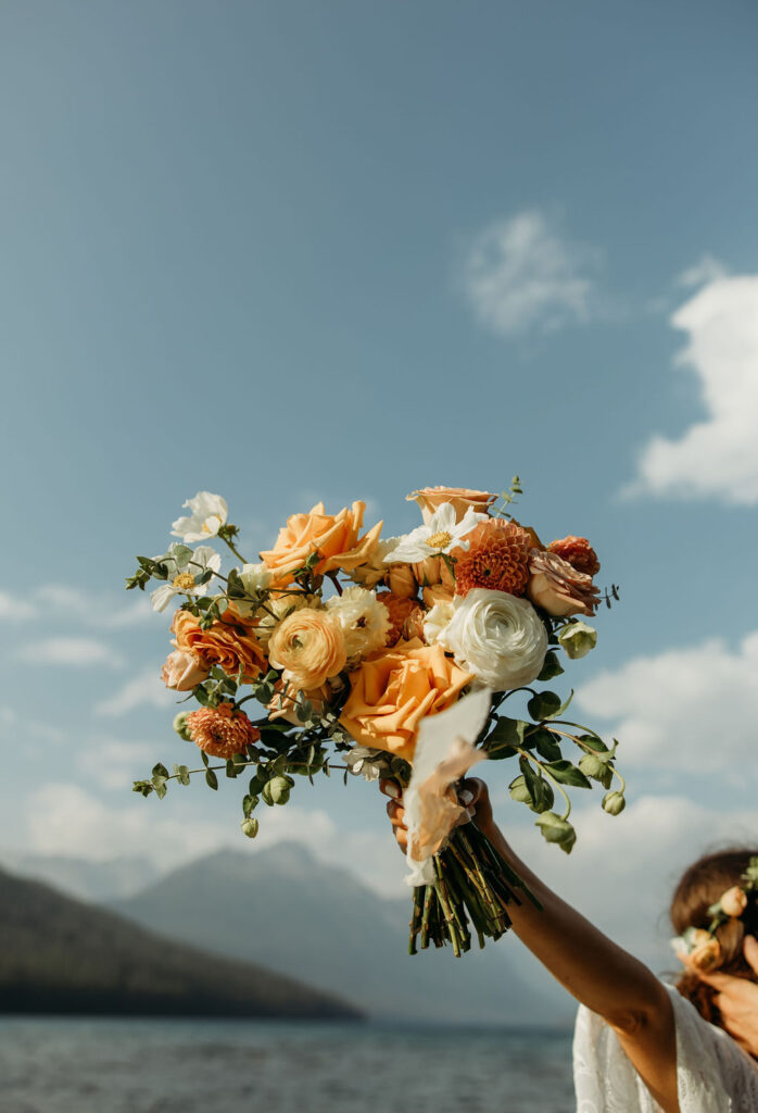 couple in montana having their elopement at bowman lake