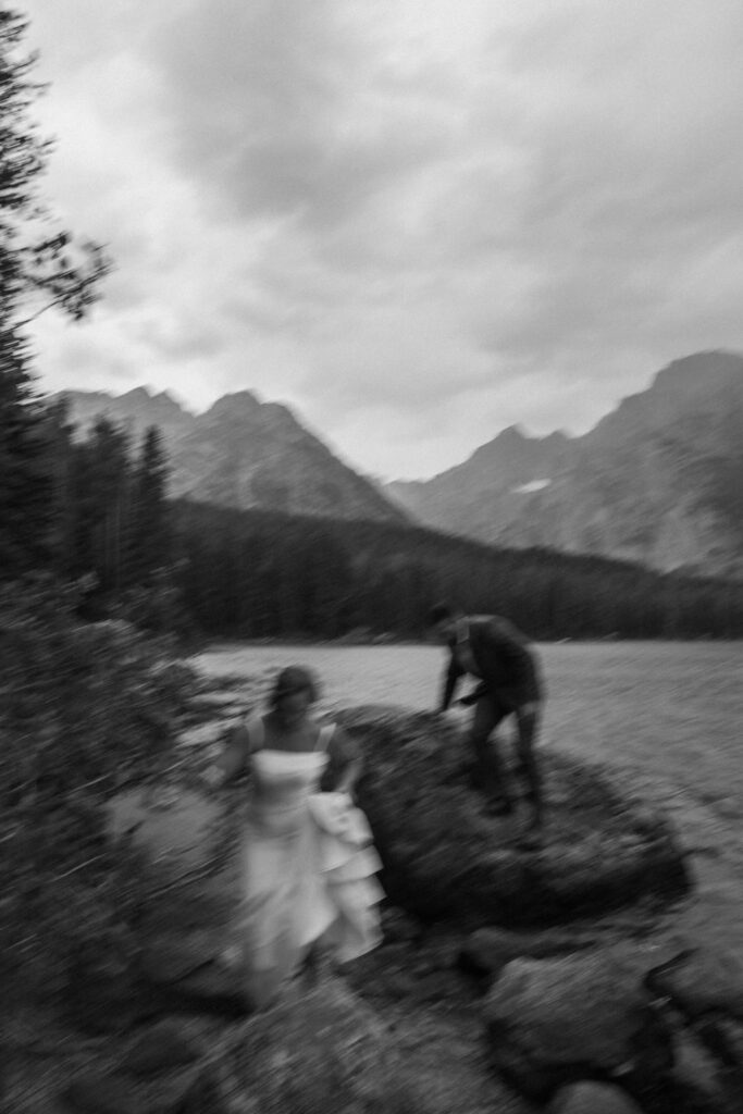 bride and groom taking outdoor elopement photos
