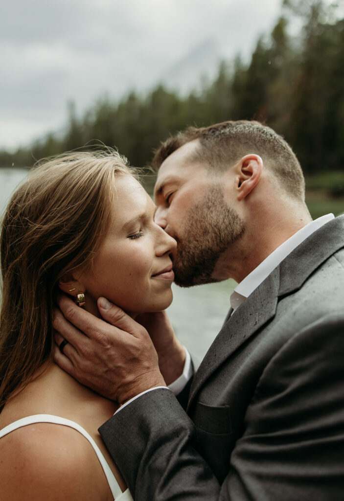 bride and groom taking outdoor elopement photos
