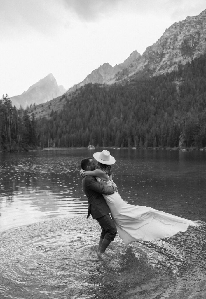 bride and groom taking outdoor elopement photos
