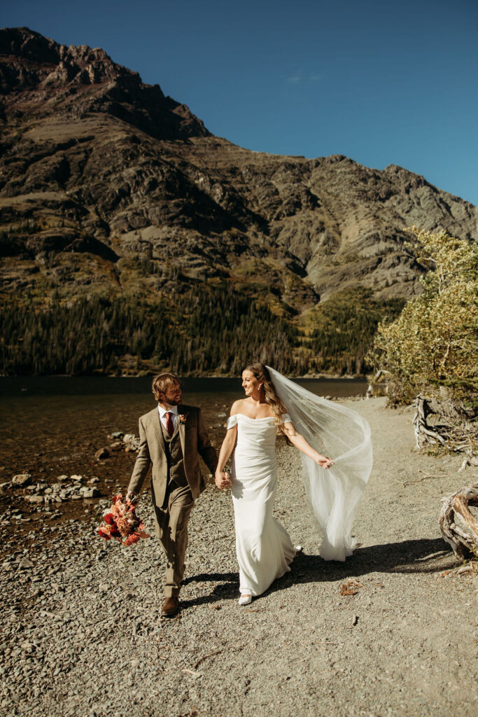 couple taking outdoor elopement photos
