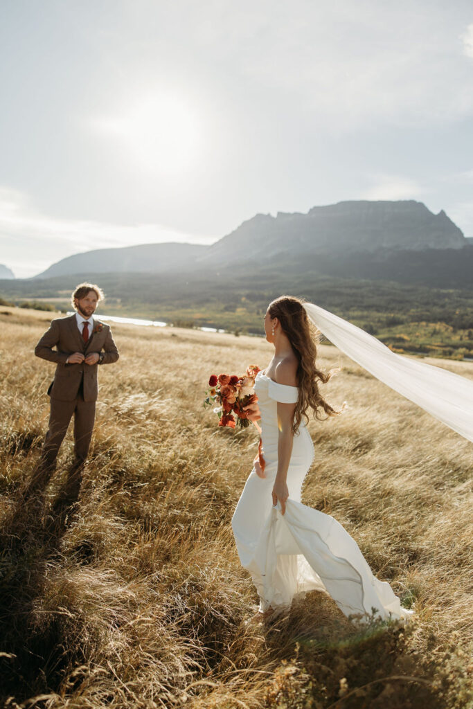 couple taking outdoor elopement photos
