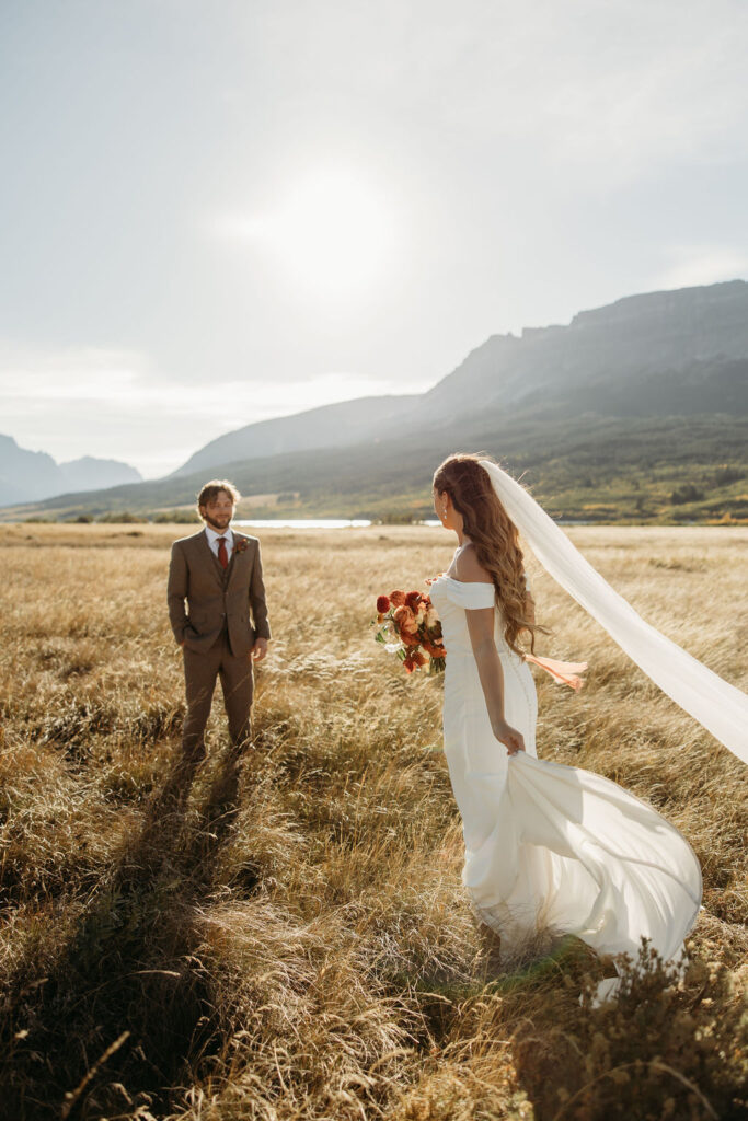 couple taking outdoor elopement photos
