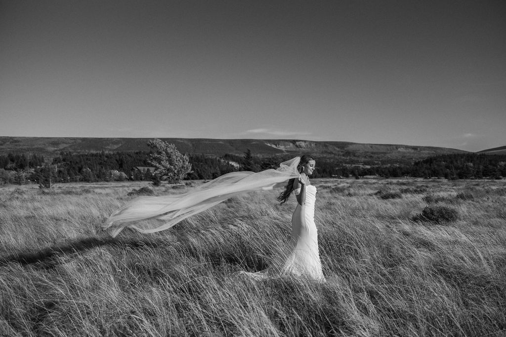 couple taking outdoor elopement photos
