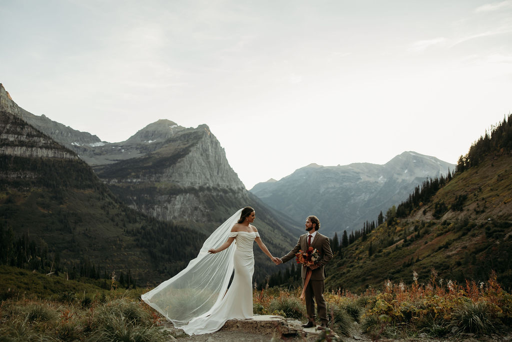 couple taking outdoor elopement photos
