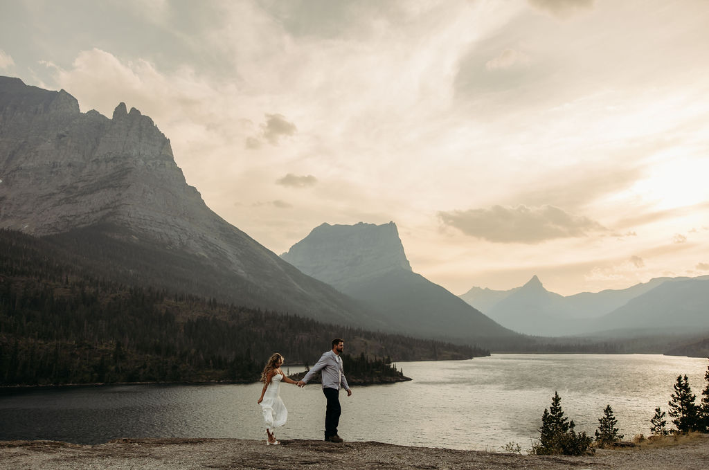 couple posing in glacier national park