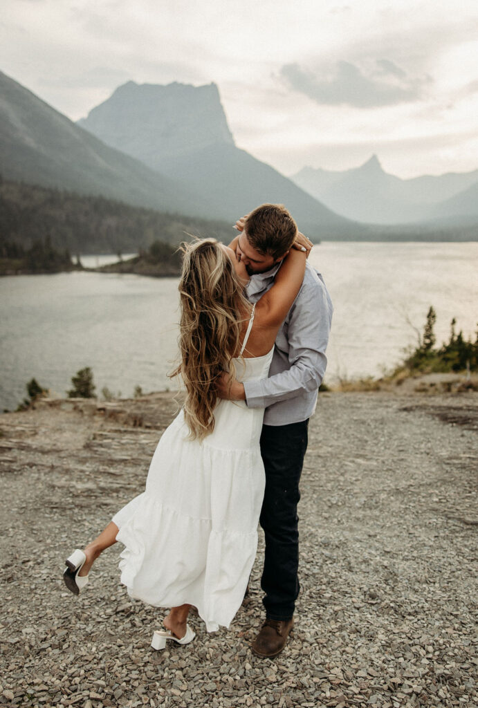 couple posing in glacier national park