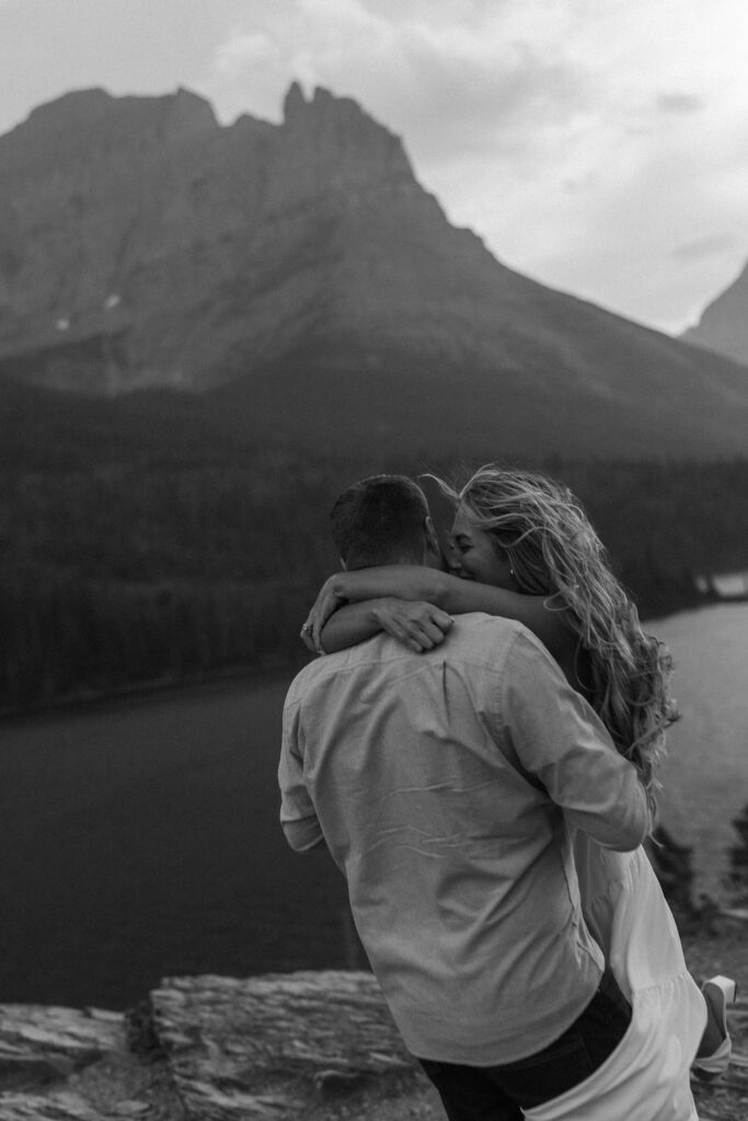 couple posing in glacier national park