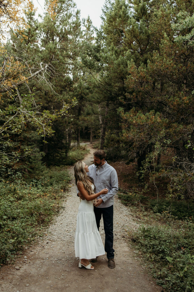 couple taking engagement pictures in montana