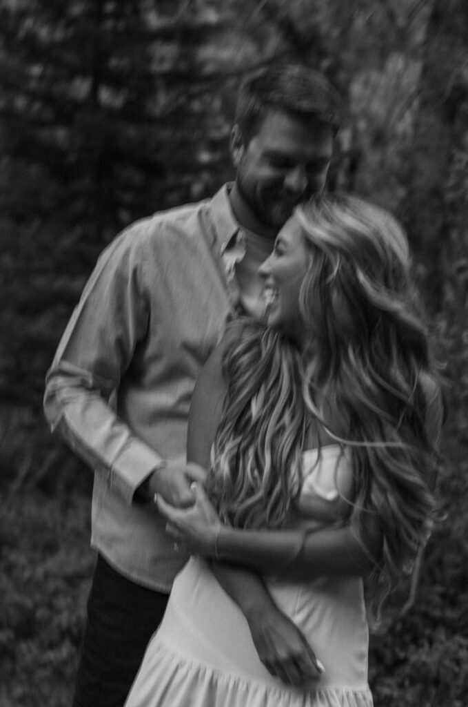 couple posing in glacier national park