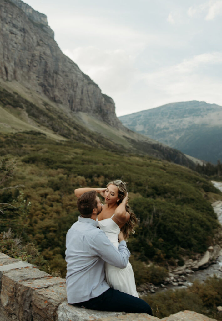 couple posing in glacier national park