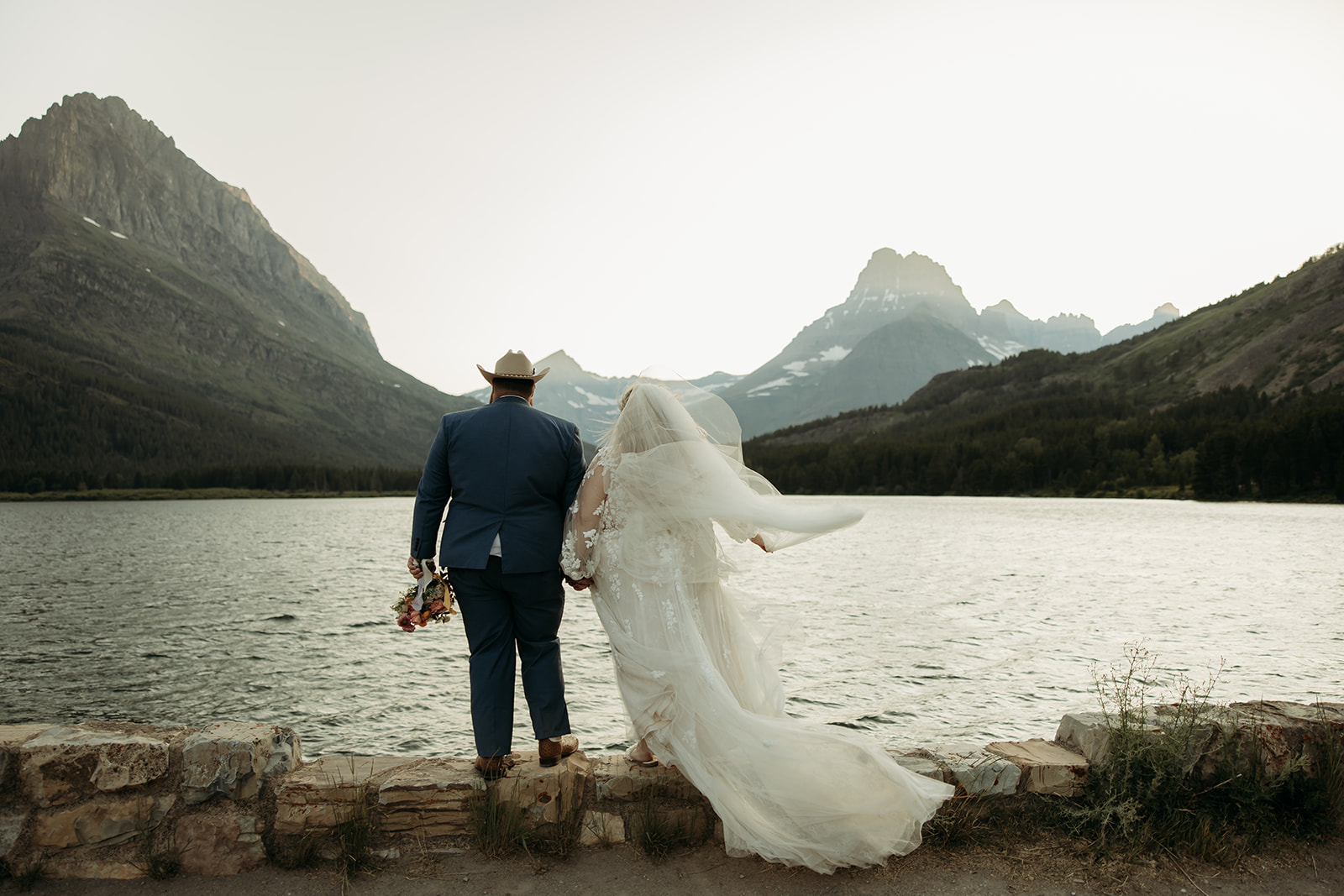 Carlye and Tyler walking by scenic trails with stunning mountain views.