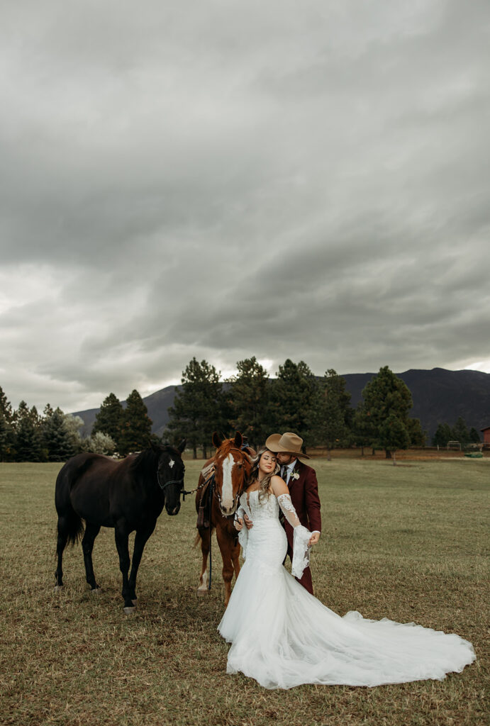 A couple standing together in Glacier National Park, capturing their adventurous destination elopement.