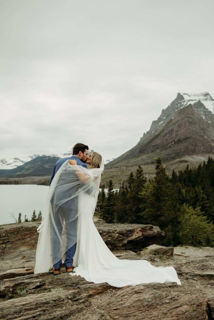 An outdoor wedding photoshoot setup in a scenic Montana meadow
