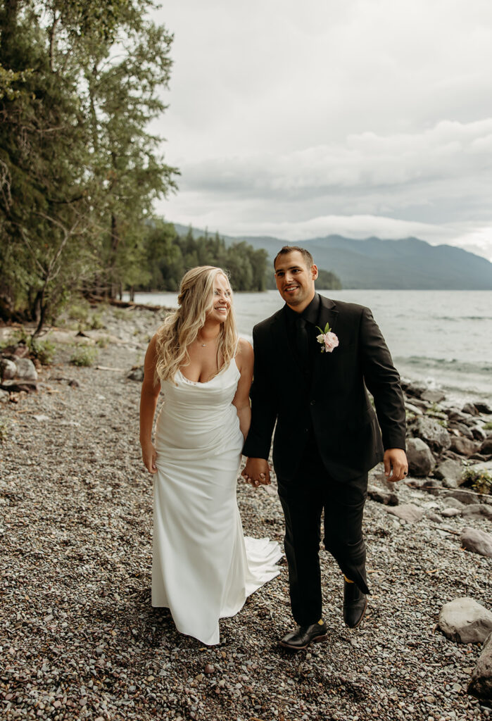 Bride and groom sharing a kiss with mountain views in Montana
