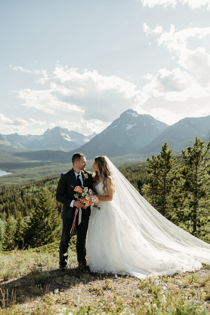 An outdoor wedding photoshoot setup in a scenic Montana meadow
