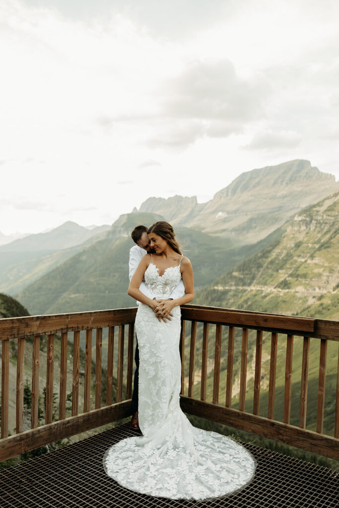 Bride and groom hiking together during their epic elopement
