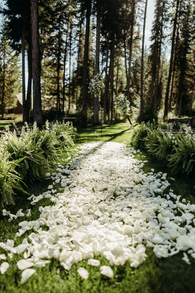 White rose petals during a montana wedding ceremony.