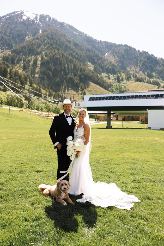 Bride and groom sharing a candid moment during their upscale western wedding celebration.
