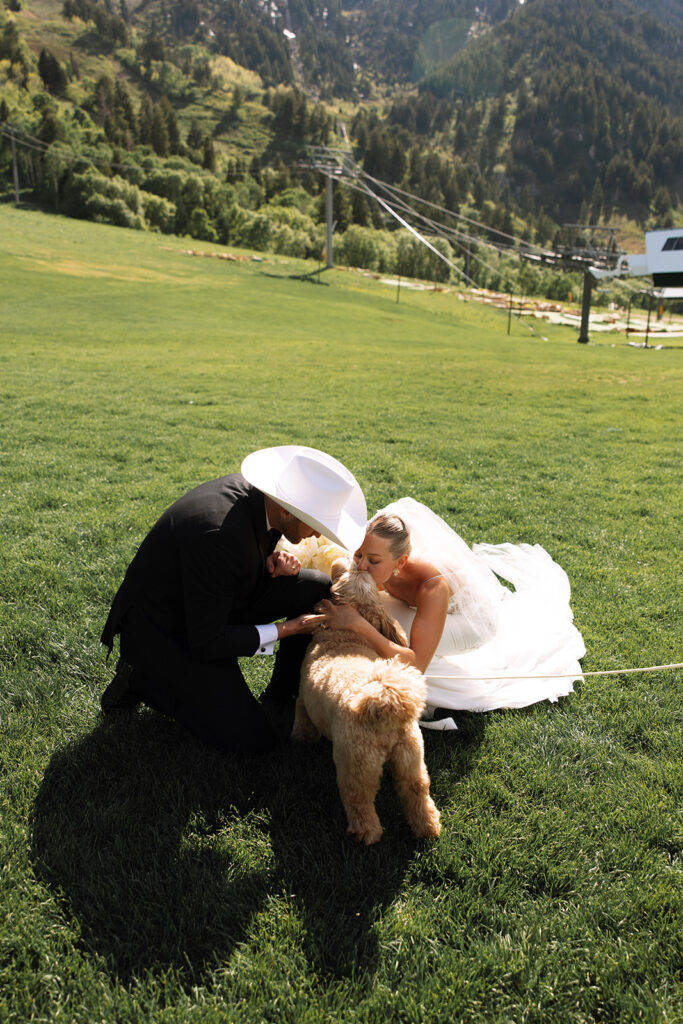 Bride and groom sharing a candid moment during their upscale western wedding celebration.
