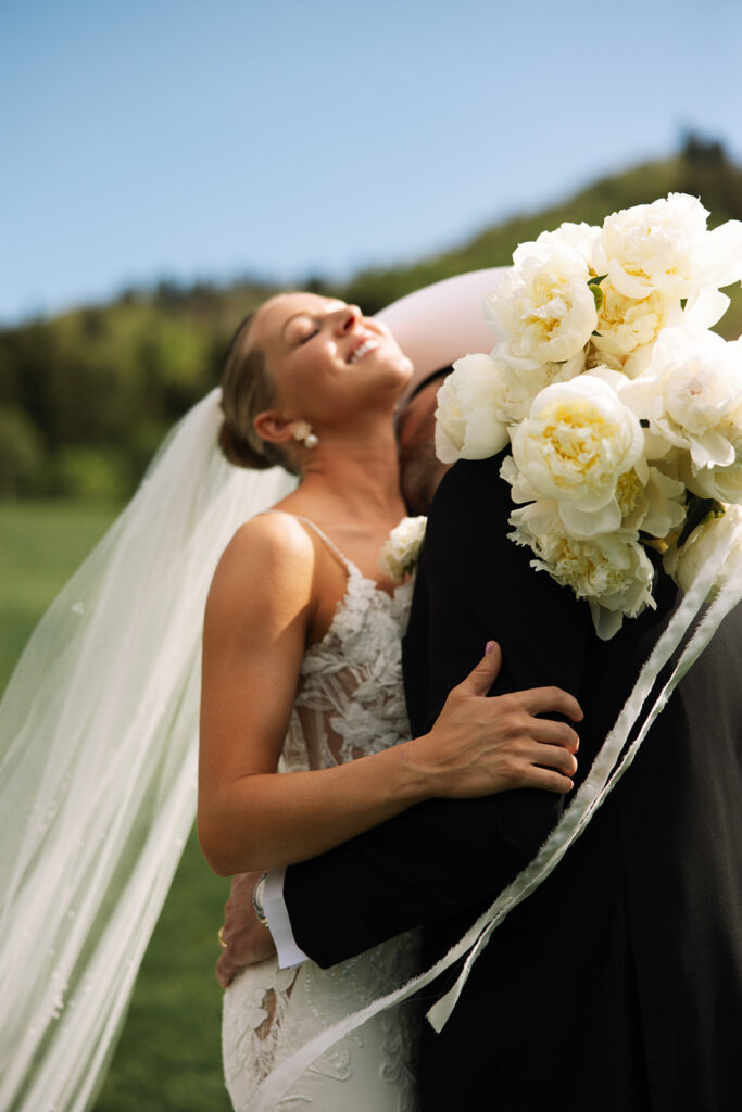 Romantic wedding day captured at a luxury mountain venue with a refined western vibe.
