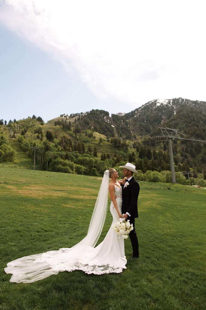 Romantic wedding day captured at a luxury mountain venue with a refined western vibe.